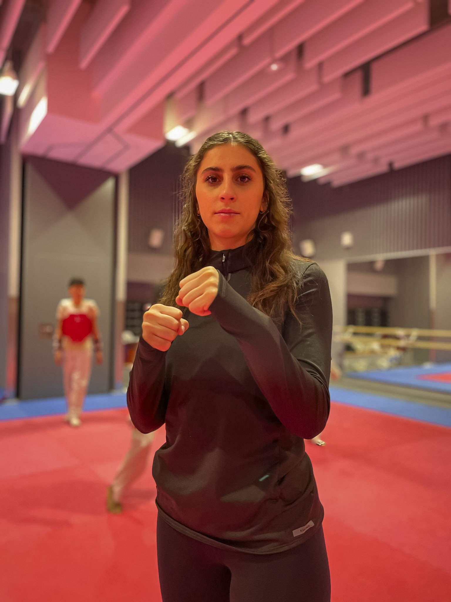 Marzieh Hamidi with her fists in a fighting pose.