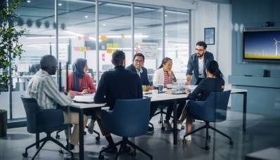 Multi-ethnic office conference room meeting